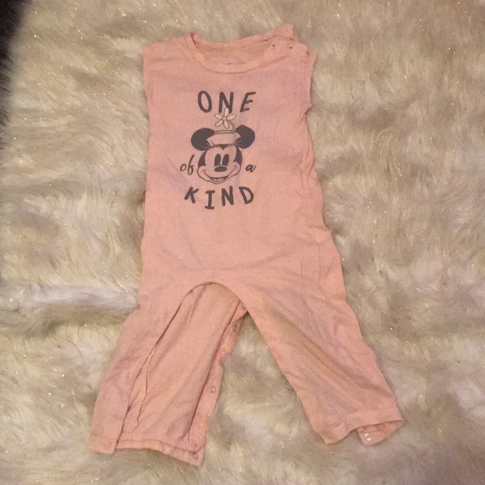 Mickey Mouse one piece romper says “one of a kind”